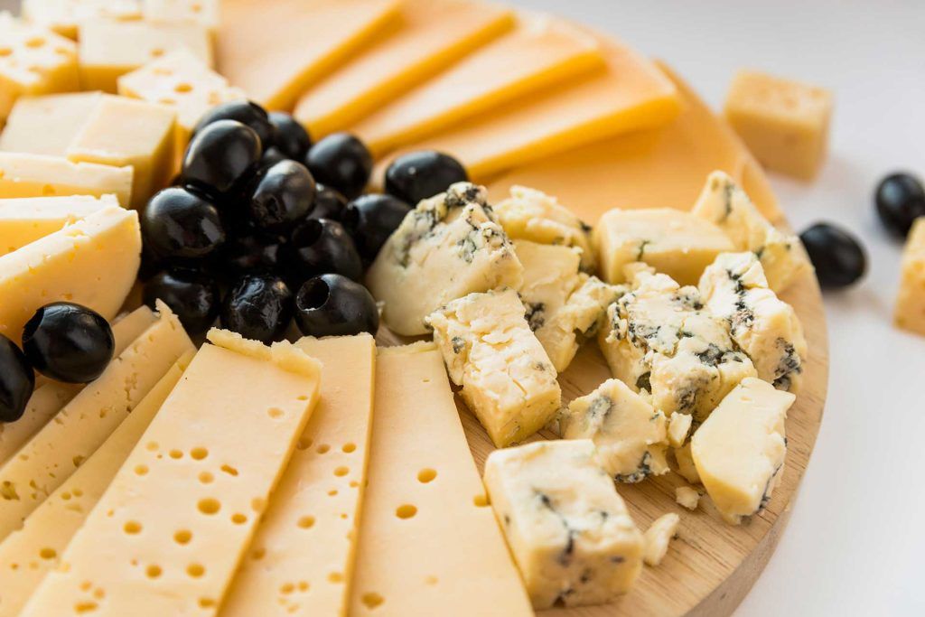 Charcuterie board types of cheese to impress your guests
